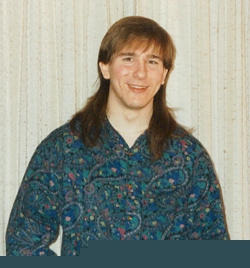 Early 90s - Hockey hair and a paisley shirt... a true geek.